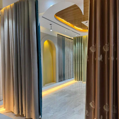 Luxury custom curtains installed in a modern Uttara apartment.