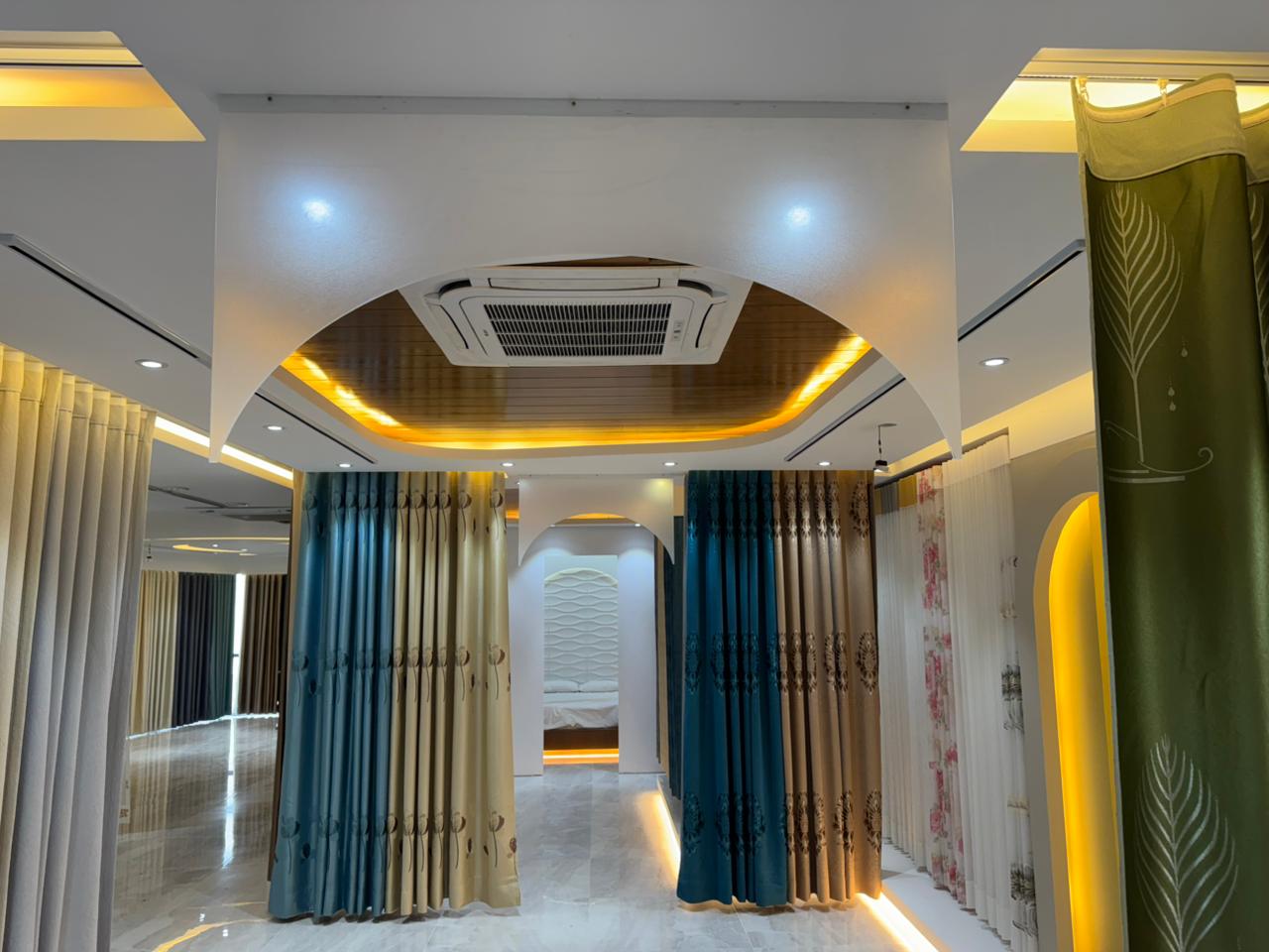 Curtivelle luxury curtain showroom display with modern drapes