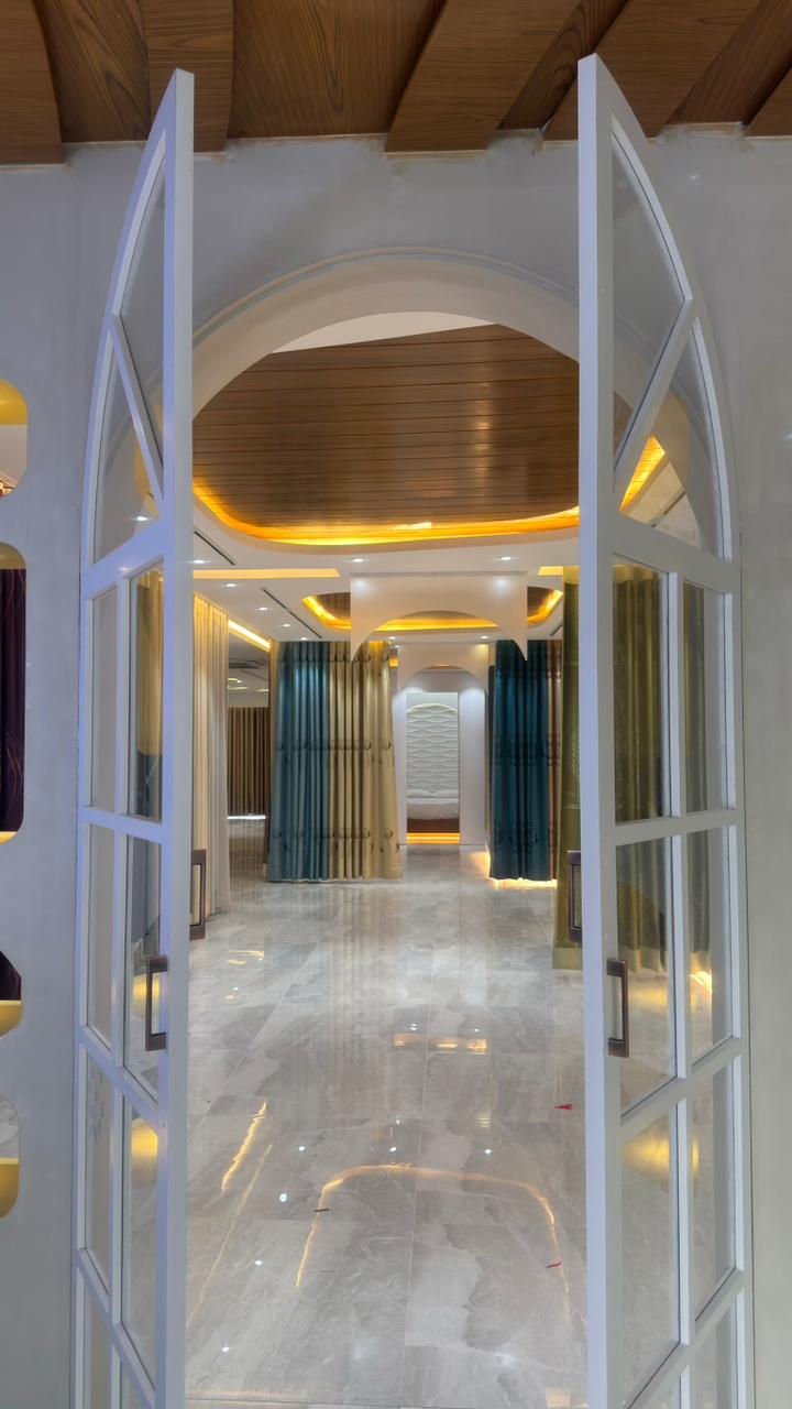 Curtivelle luxury curtain showroom entrance and interior display