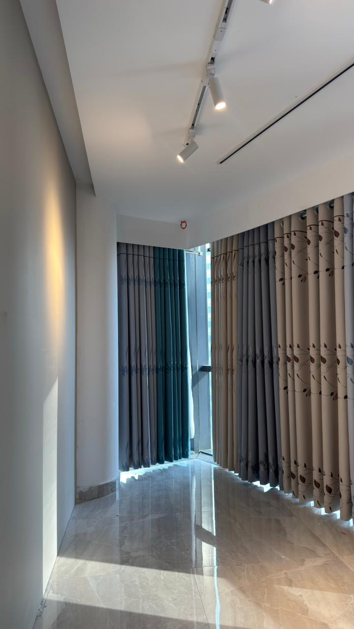Luxury curtain showroom interior with arched decor and fabric displays
