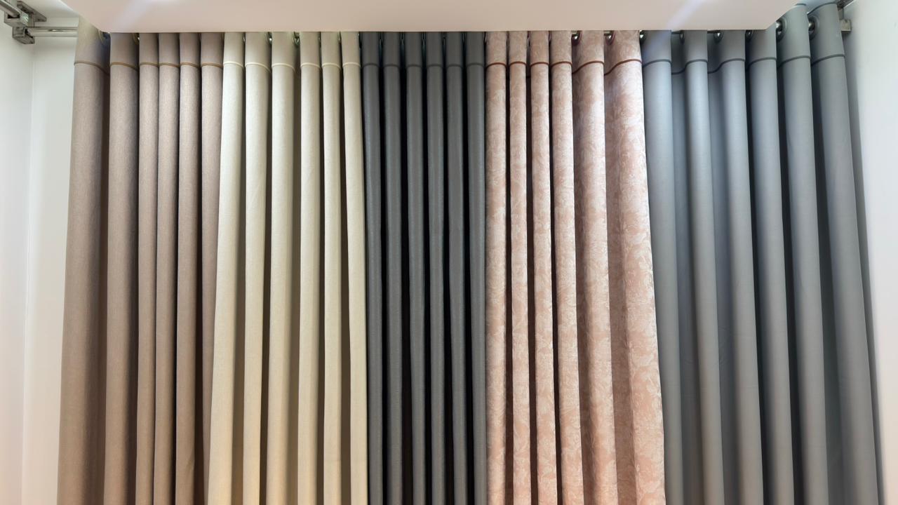 Luxury curtain showroom interior with arched decor and fabric displays