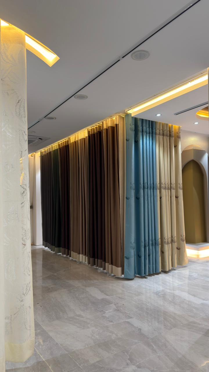 Luxury curtain showroom interior with arched decor and fabric displays